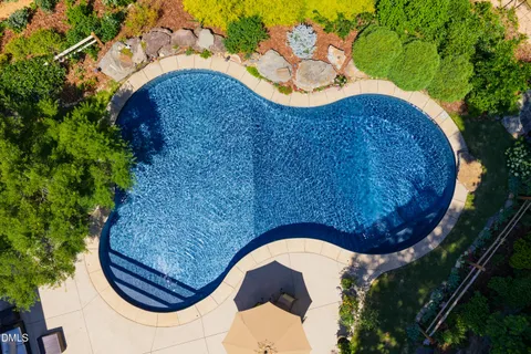 $975,000 | 212 Middlegreen Place, Holly Springs, NC 27540