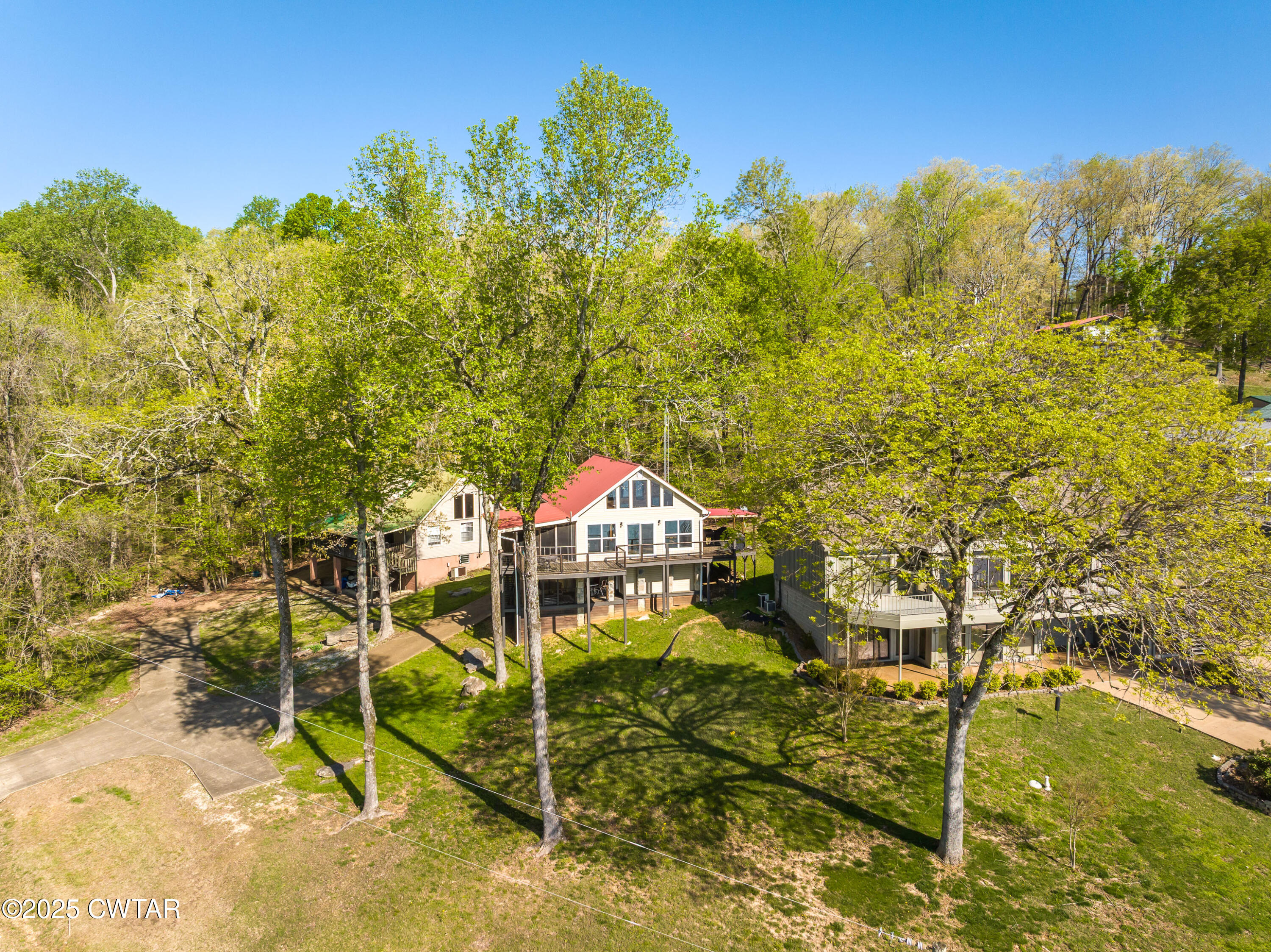 229 Bill Perry Drive Sugar Tree, TN 38380 - Photo 2 of 42 a view of a swimming pool with a yard