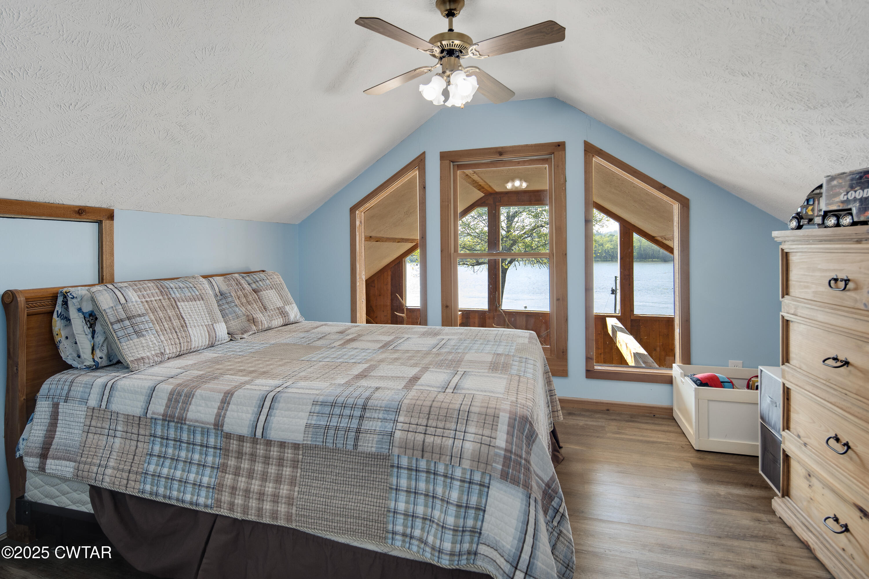 229 Bill Perry Drive Sugar Tree, TN 38380 - Photo 26 of 42 a bedroom with a bed and a window