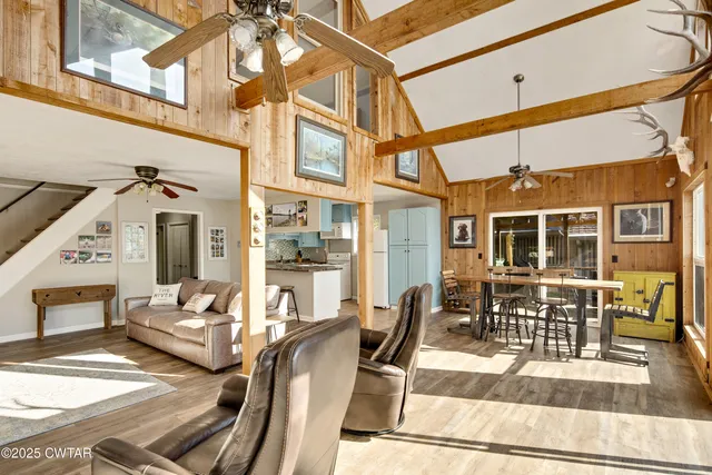 a view of a patio with couches table and chairs