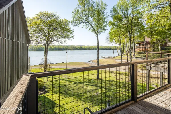 a view of a swimming pool with a chair