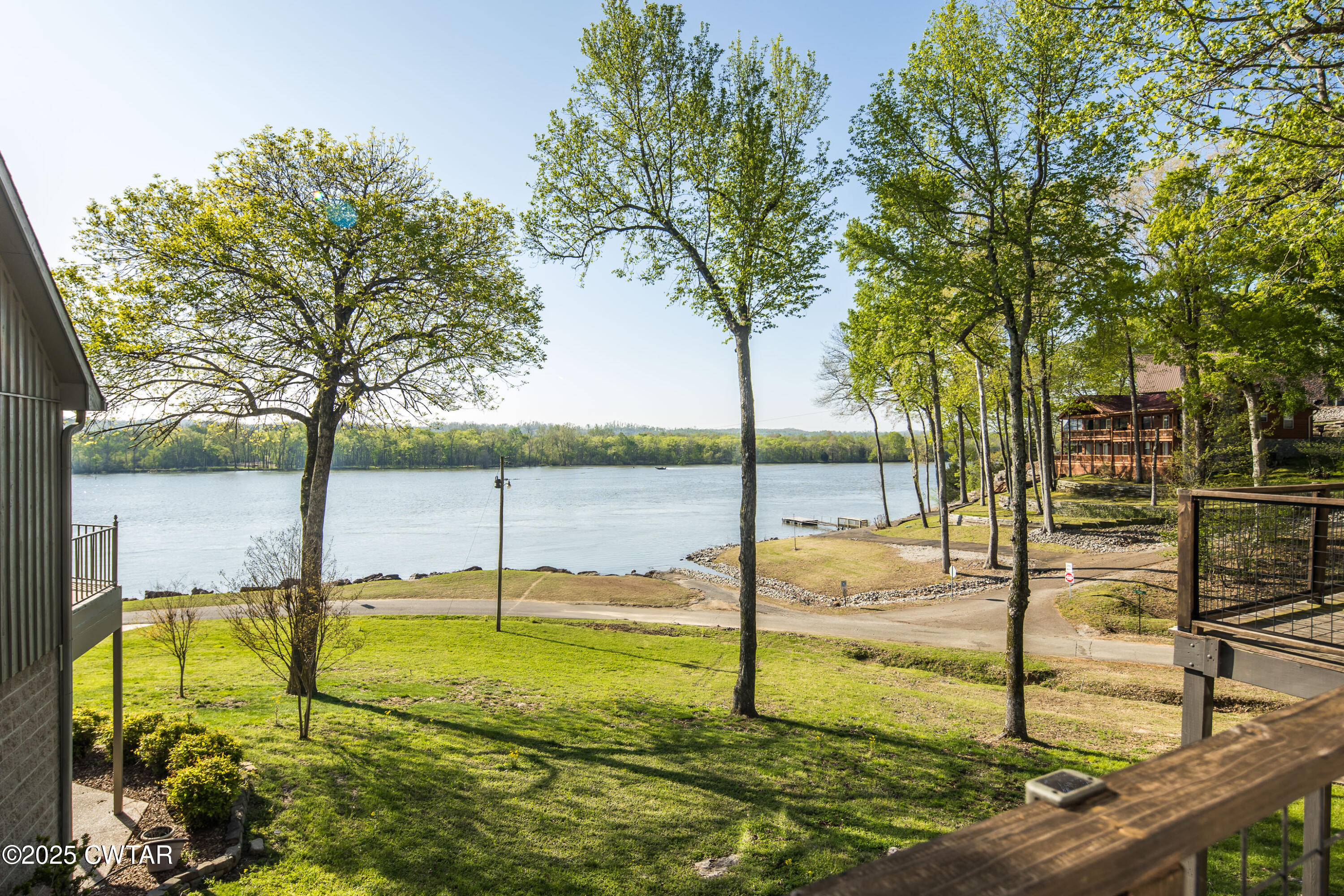 229 Bill Perry Drive Sugar Tree, TN 38380 - Photo 34 of 42 a view of a swimming pool with a chair