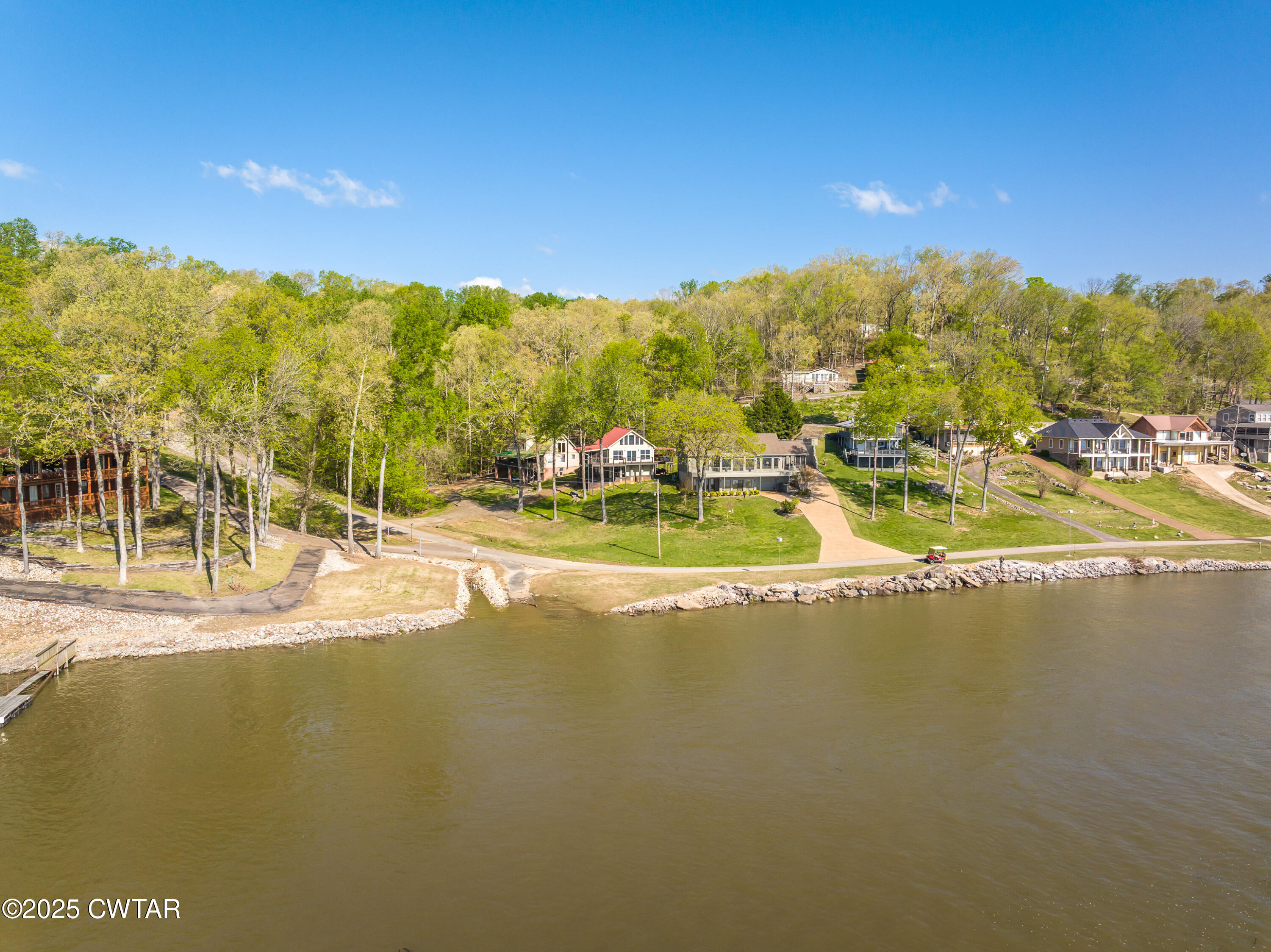 229 Bill Perry Drive Sugar Tree, TN 38380 - Photo 4 of 42 a view of a swimming pool with an ocean