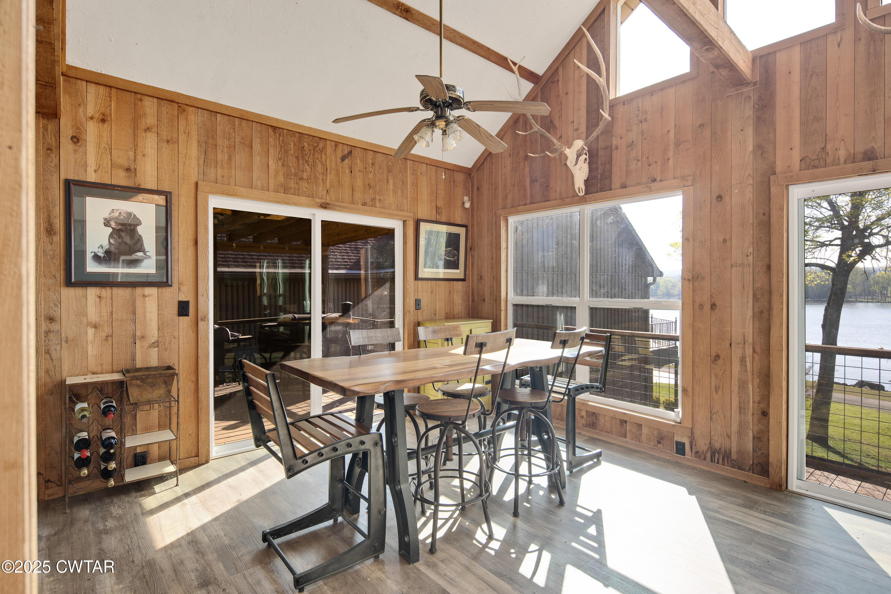 229 Bill Perry Drive Sugar Tree, TN 38380 - Photo 10 of 42 a view of a dining room with furniture window and outside view