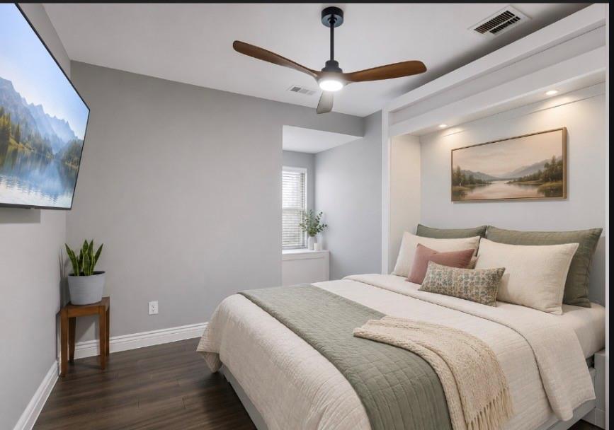 1805 Huntsman Way Forney, TX 75126 - Photo 19 of 36 a bedroom with a bed and a chandelier