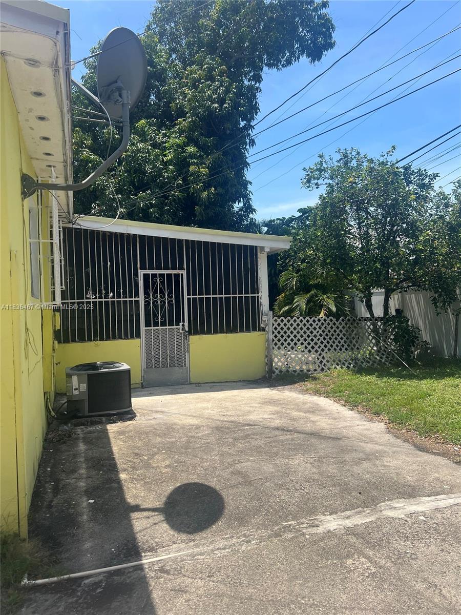 1825 Northwest 112th Street Miami, FL 33167 - Photo 5 of 24 a view of a backyard with a garden