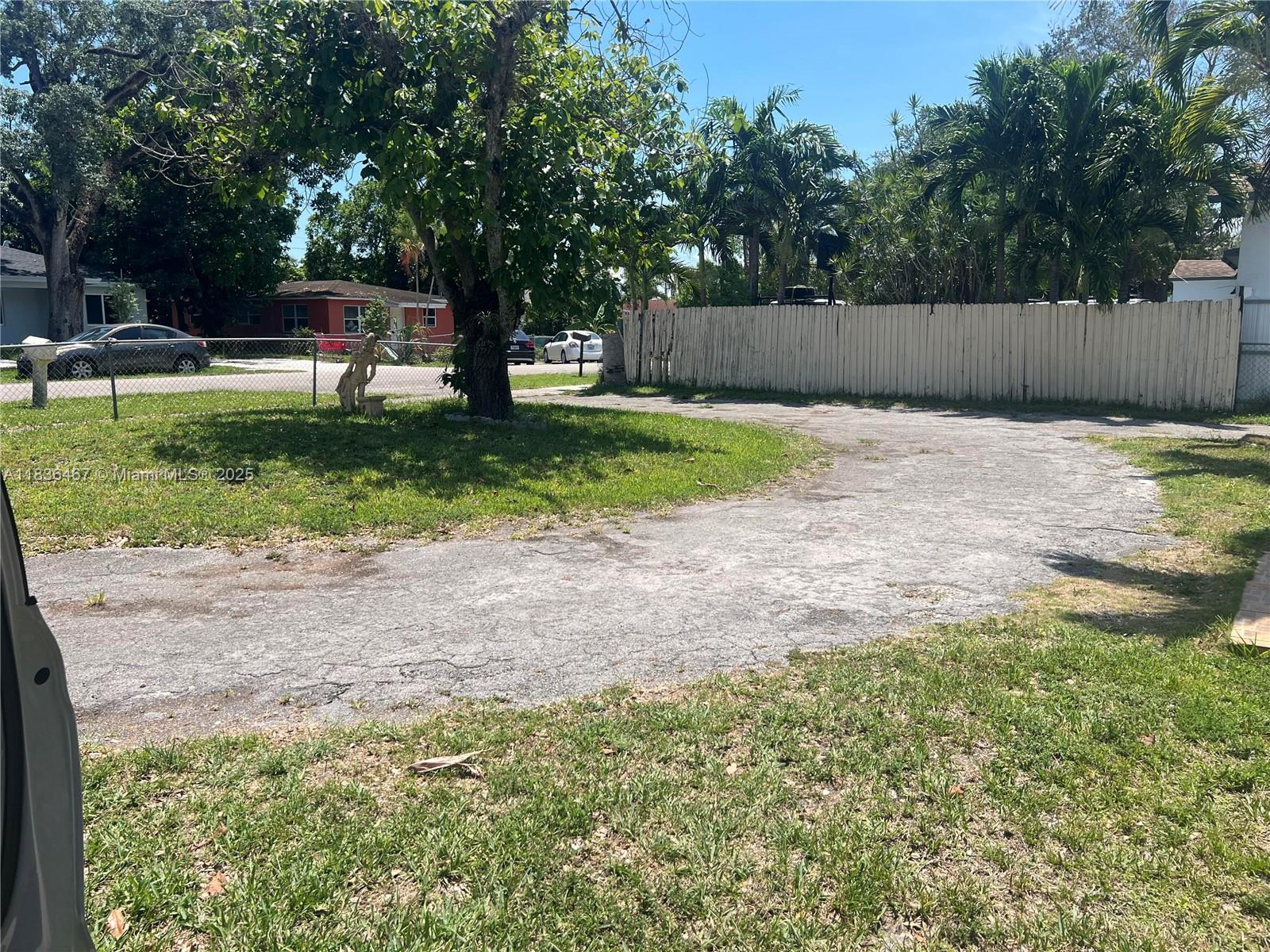 1825 Northwest 112th Street Miami, FL 33167 - Photo 9 of 24 a view of a park with large trees