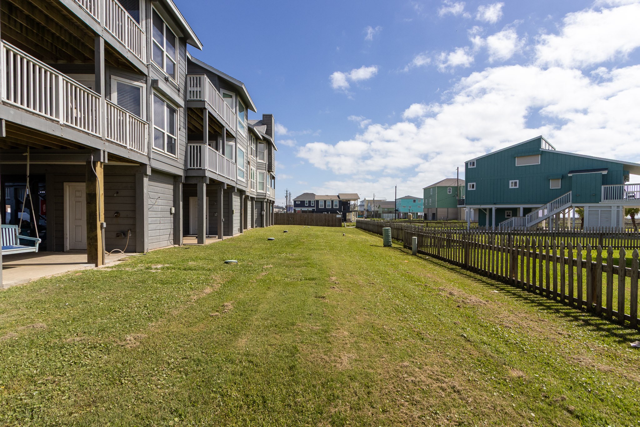 17609 Termini-San Luis Pass Road Galveston, TX 77554 - Photo 20 of 37 a view of a building with a swimming pool