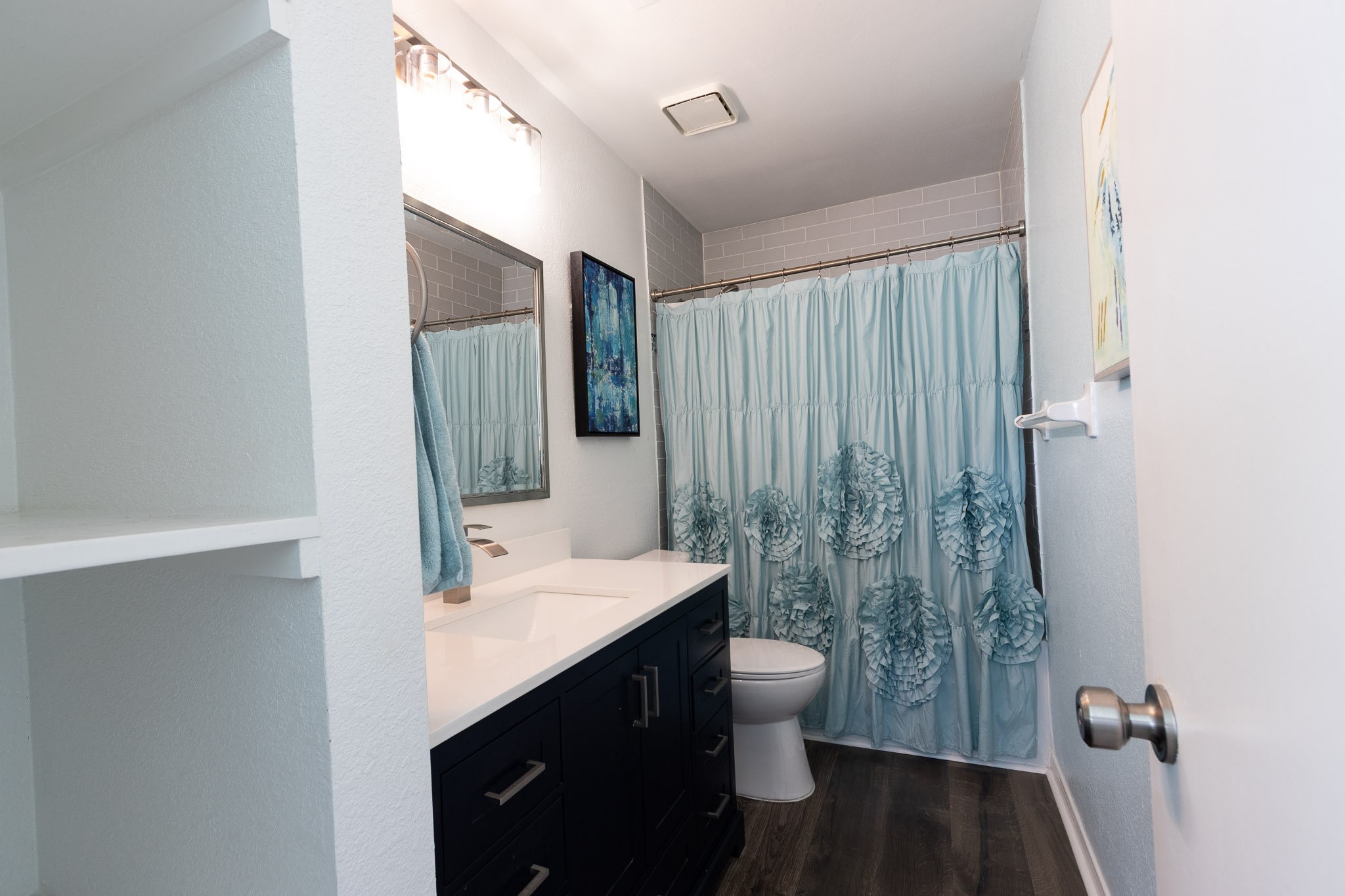 17609 Termini-San Luis Pass Road Galveston, TX 77554 - Photo 23 of 37 a bathroom with a toilet sink and mirror
