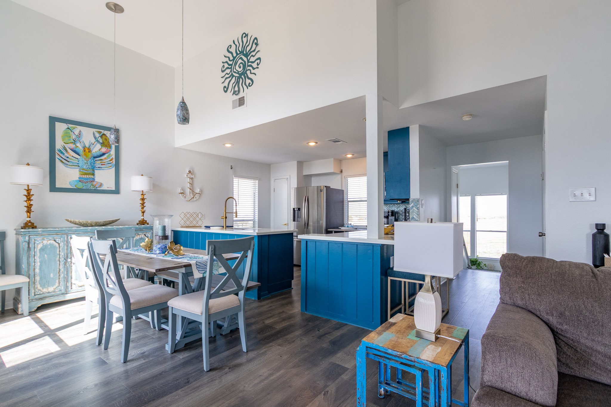 17609 Termini-San Luis Pass Road Galveston, TX 77554 - Photo 30 of 37 a view of a dining room with furniture and wooden floor