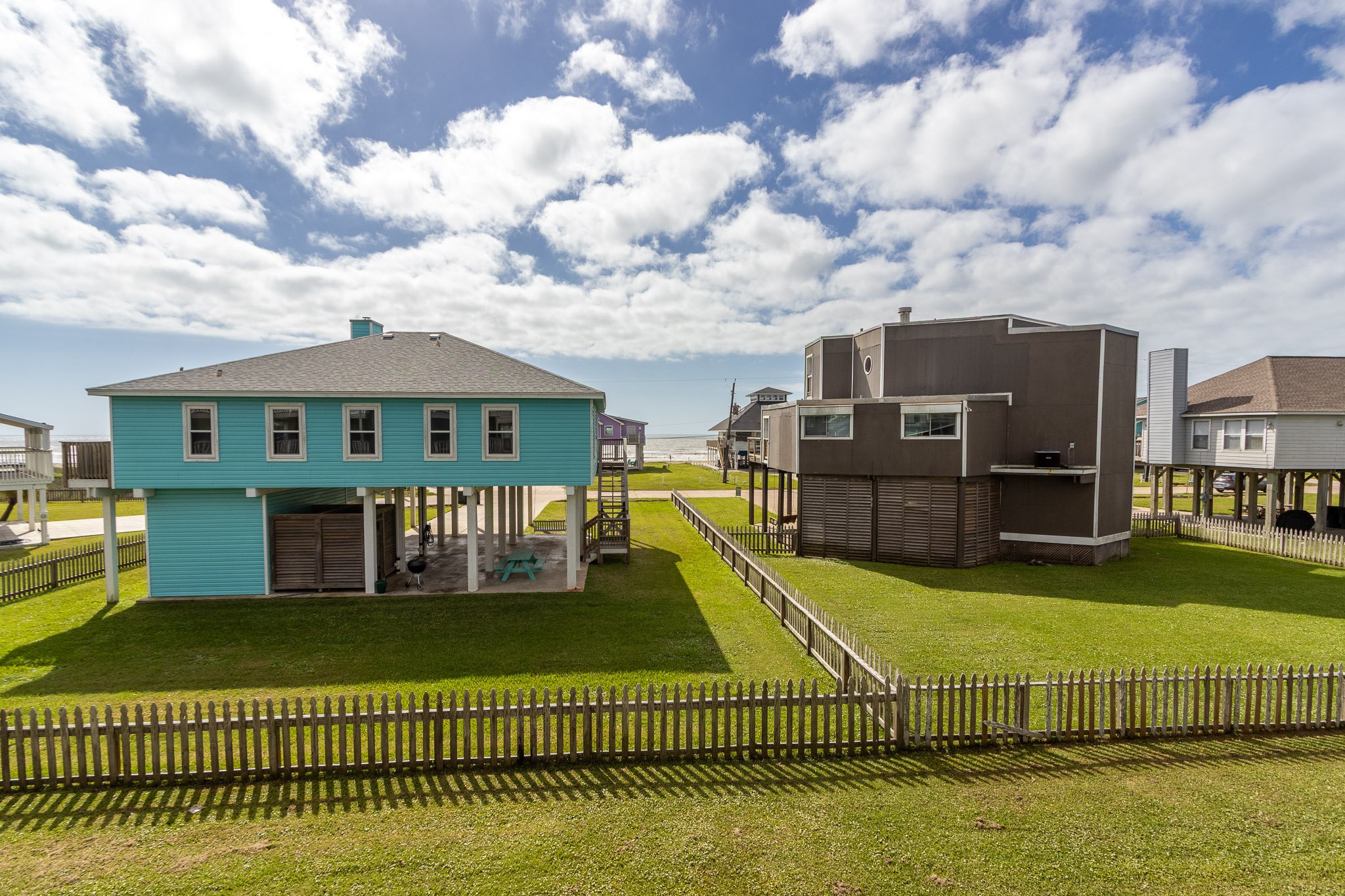 17609 Termini-San Luis Pass Road Galveston, TX 77554 - Photo 34 of 37 a view of a house with a swimming pool