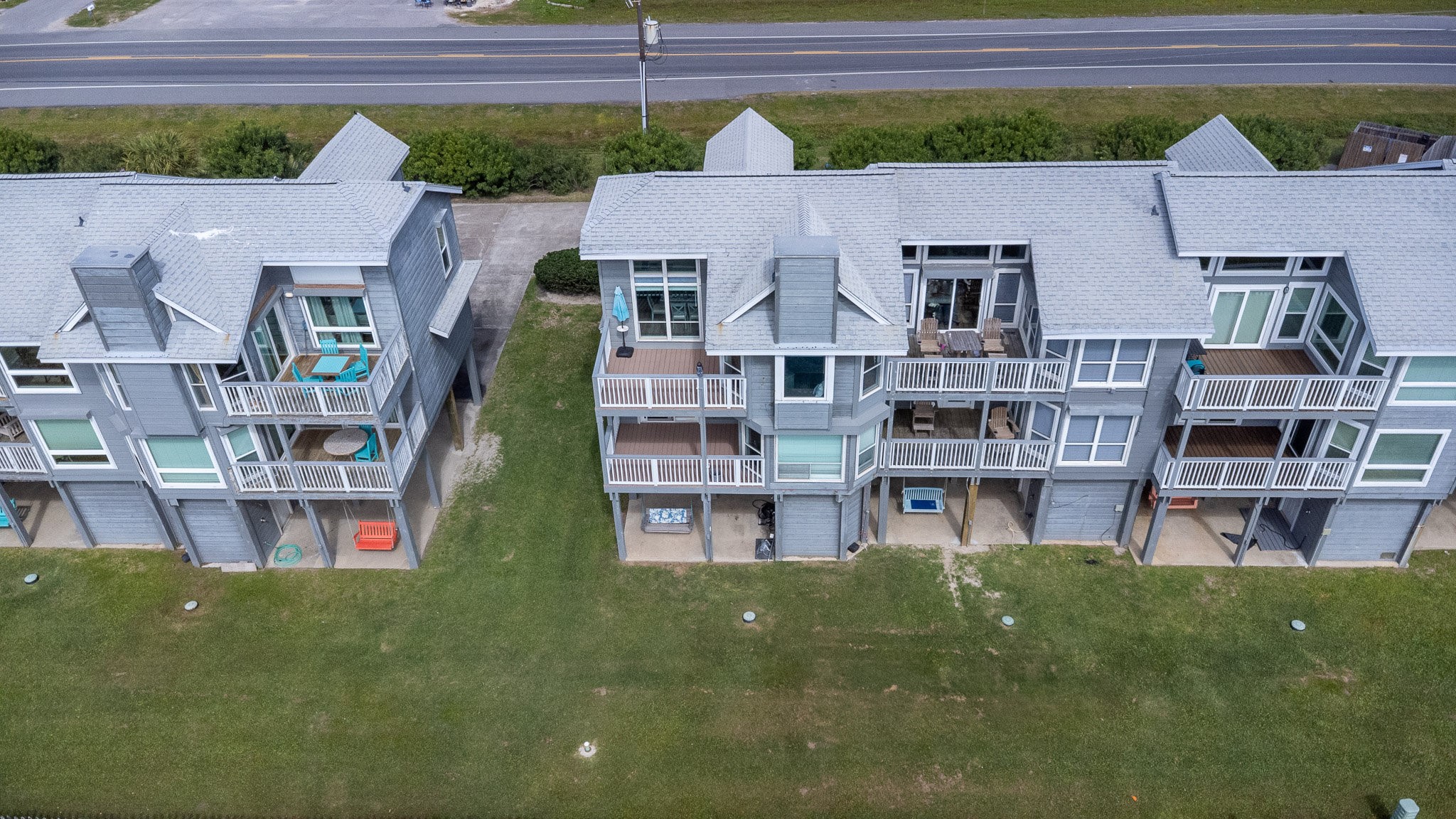 17609 Termini-San Luis Pass Road Galveston, TX 77554 - Photo 4 of 37 an aerial view of a house with a swimming pool