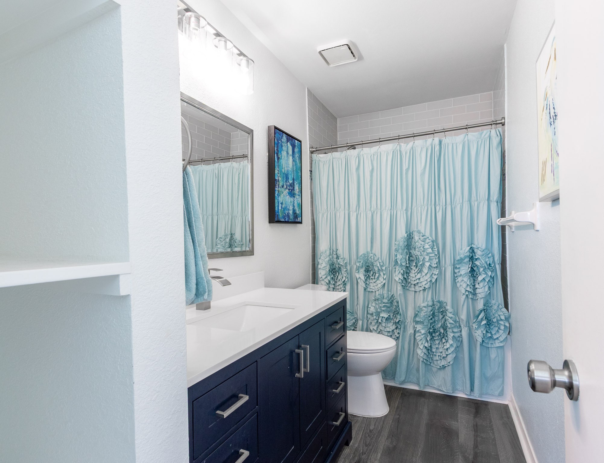17609 Termini-San Luis Pass Road Galveston, TX 77554 - Photo 6 of 37 a bathroom with a double vanity sink toilet and shower