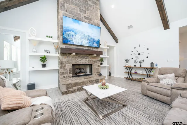 a play room with furniture and wooden floor