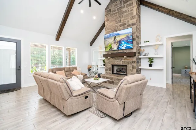 a view of a dining tables and chairs in a patio