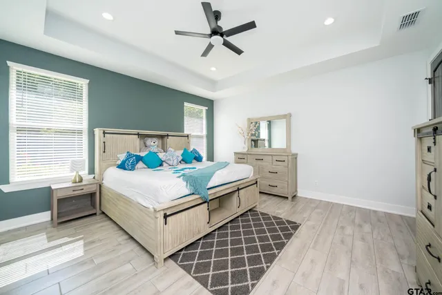 a view of a patio with couches chairs and a table and chairs