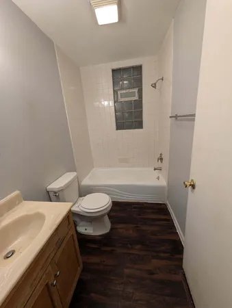 a bathroom with a sink and a toilet