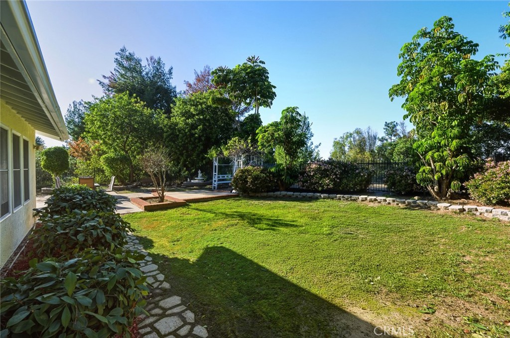 21465 Running Branch Road Diamond Bar, CA 91765 - Photo 14 of 47 a view of a backyard with large trees