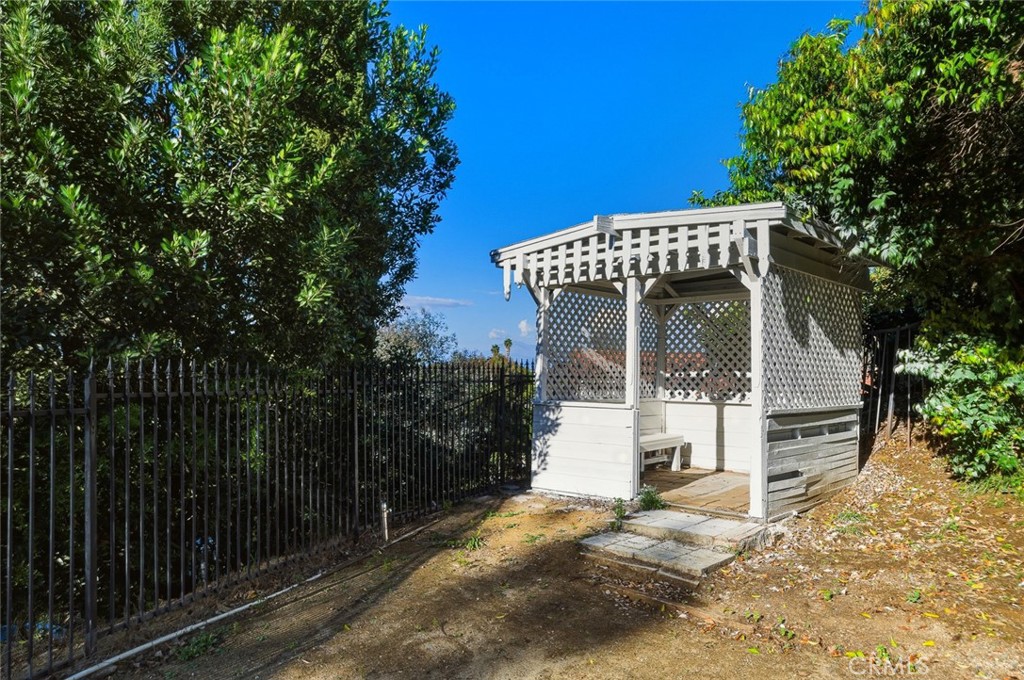21465 Running Branch Road Diamond Bar, CA 91765 - Photo 17 of 47 a front view of a house with a yard