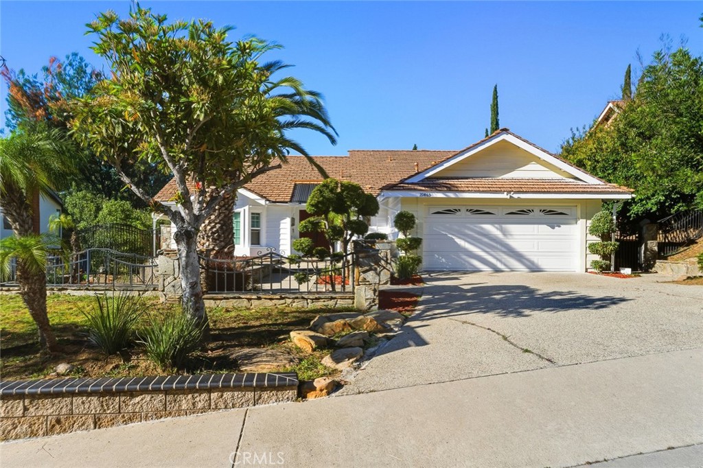 21465 Running Branch Road Diamond Bar, CA 91765 - Photo 2 of 47 a front view of a house with garden