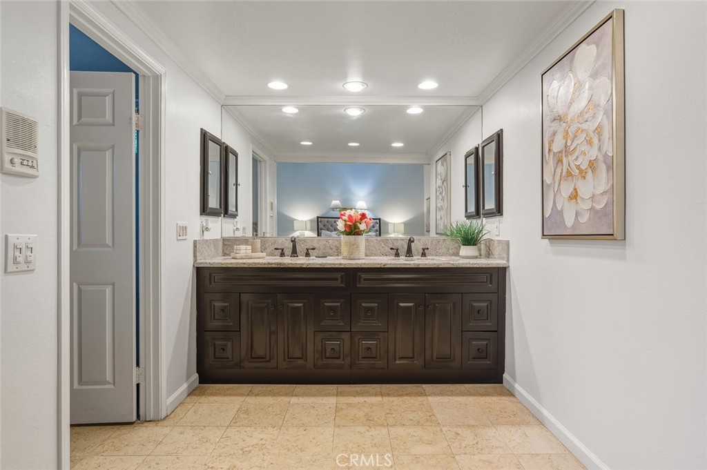 21465 Running Branch Road Diamond Bar, CA 91765 - Photo 29 of 47 a bathroom with a sink double vanity and a mirror