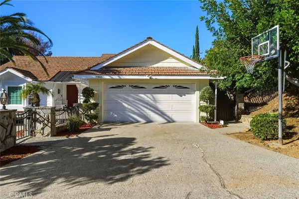 a front view of a house with yard