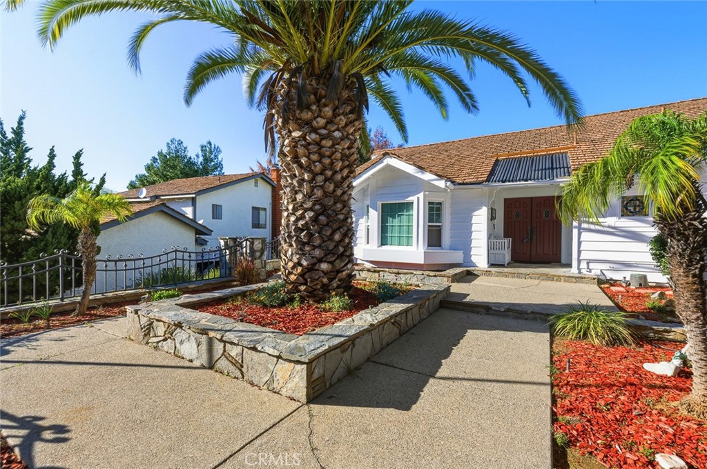 21465 Running Branch Road Diamond Bar, CA 91765 - Photo 4 of 47 a view of a backyard with plants and patio