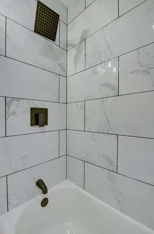 a bathroom with a bathtub