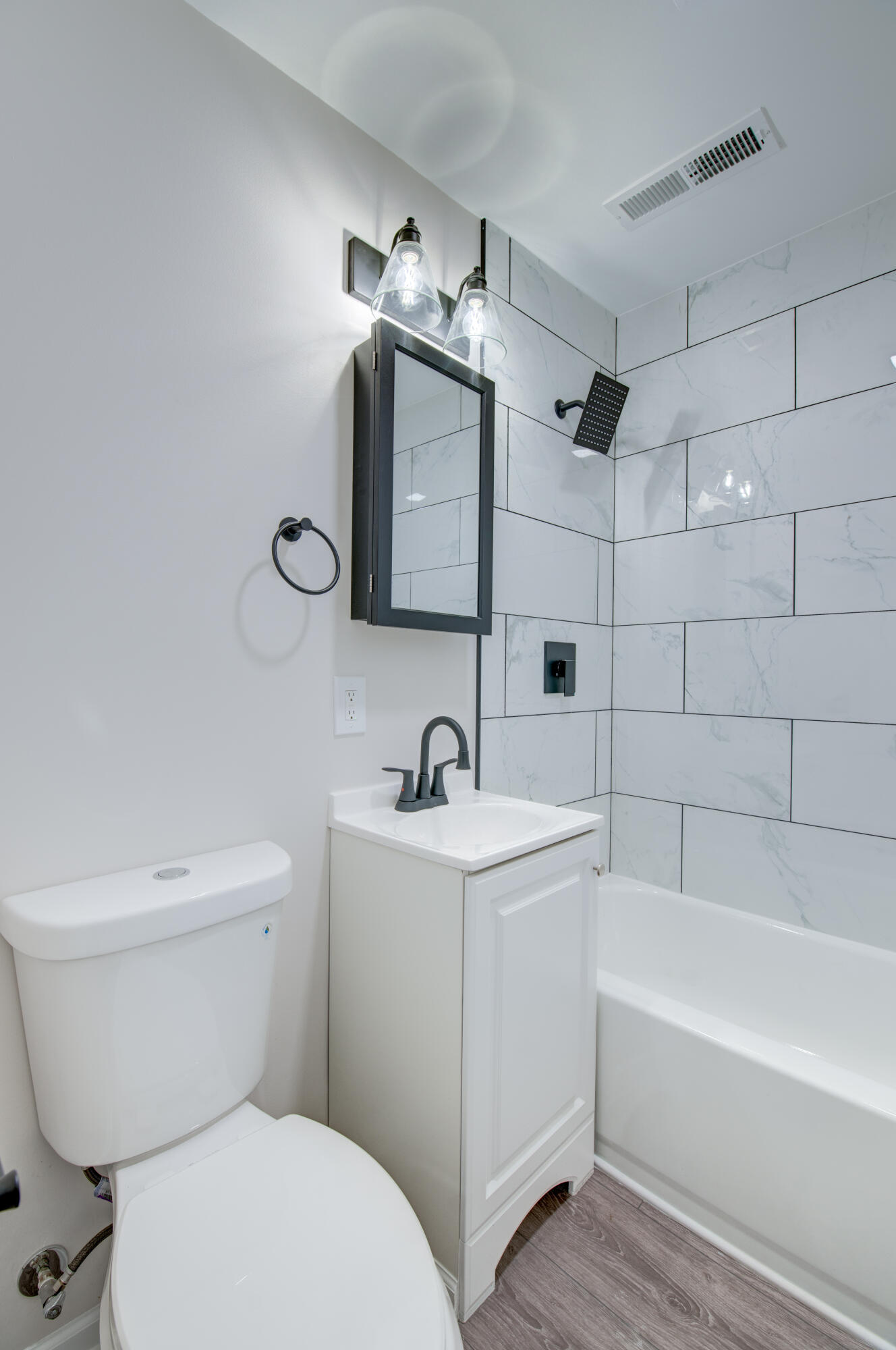 1000 Durbin Street Gary, IN 46406 - Photo 9 of 15 a bathroom with a sink a toilet and shower