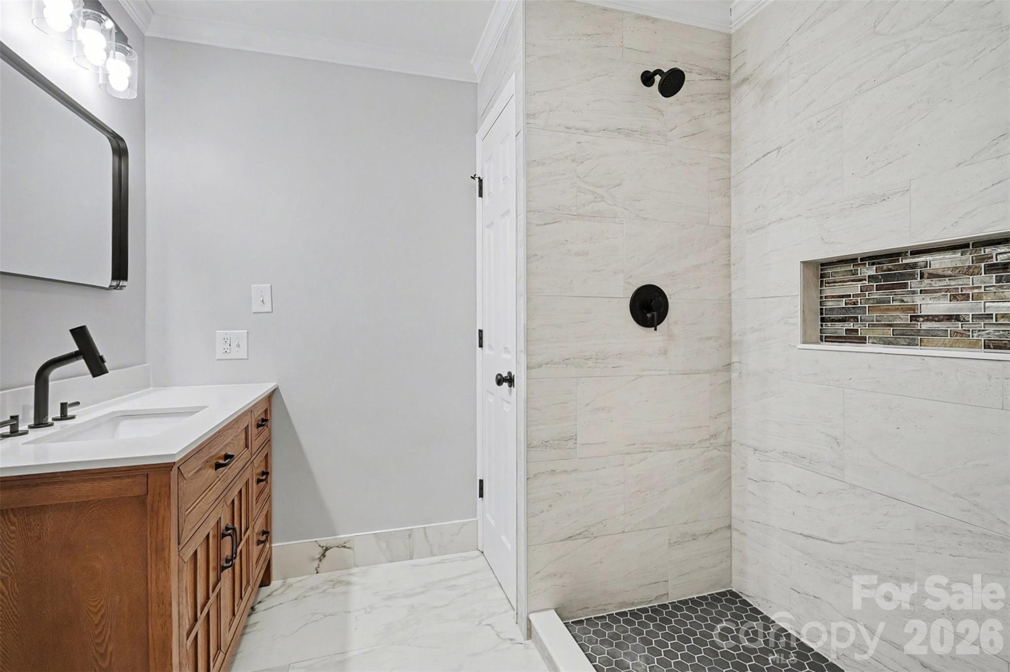 1994 Greenleaf Road Clover, SC 29710 - Photo 22 of 32 a bathroom with a sink a toilet a mirror and shower