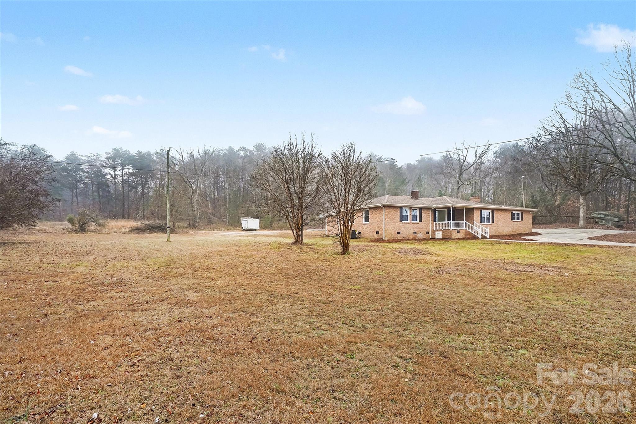 1994 Greenleaf Road Clover, SC 29710 - Photo 30 of 32 a view of swimming pool and trees in the background