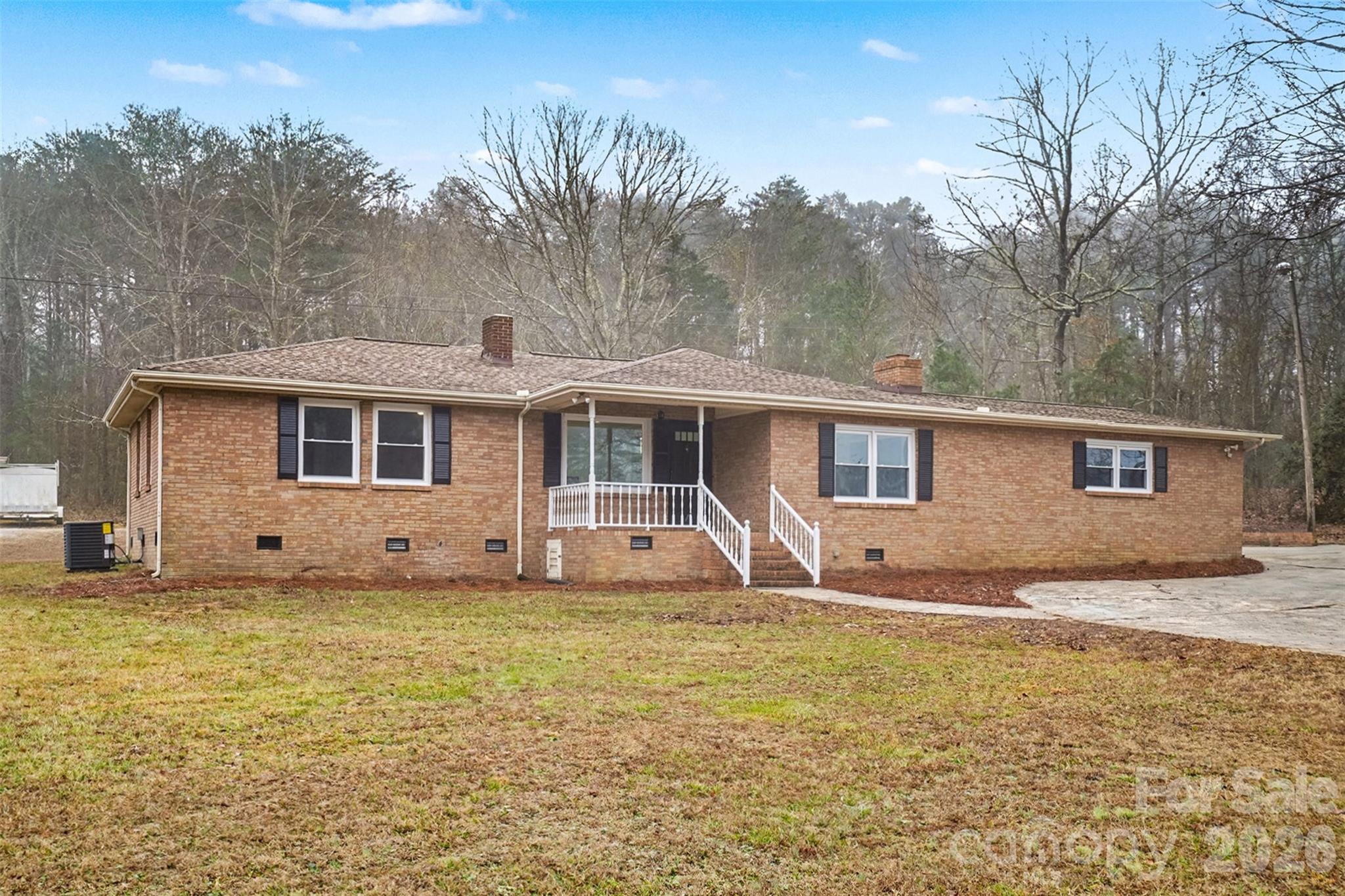 1994 Greenleaf Road Clover, SC 29710 - Photo 31 of 32 a front view of a house with garden