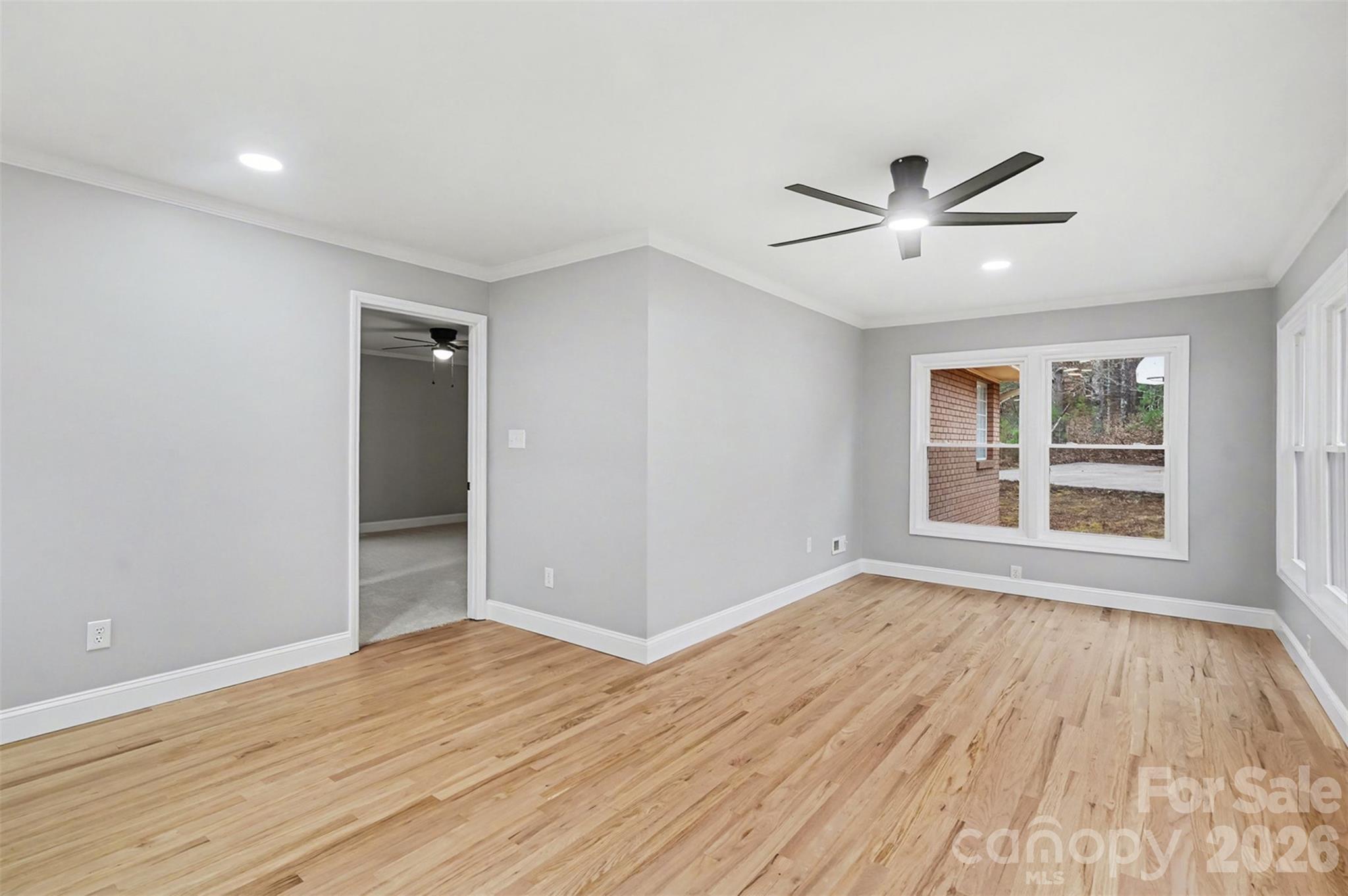 1994 Greenleaf Road Clover, SC 29710 - Photo 6 of 32 a view of empty room with wooden floor and fan