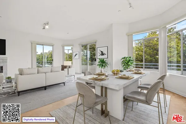 a kitchen with stainless steel appliances granite countertop a refrigerator and cabinets