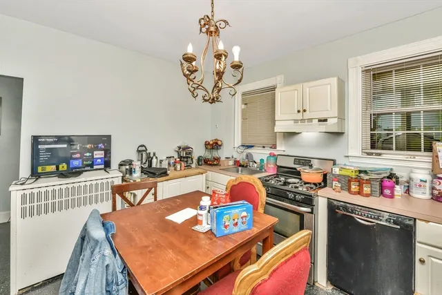 a living room filled with furniture