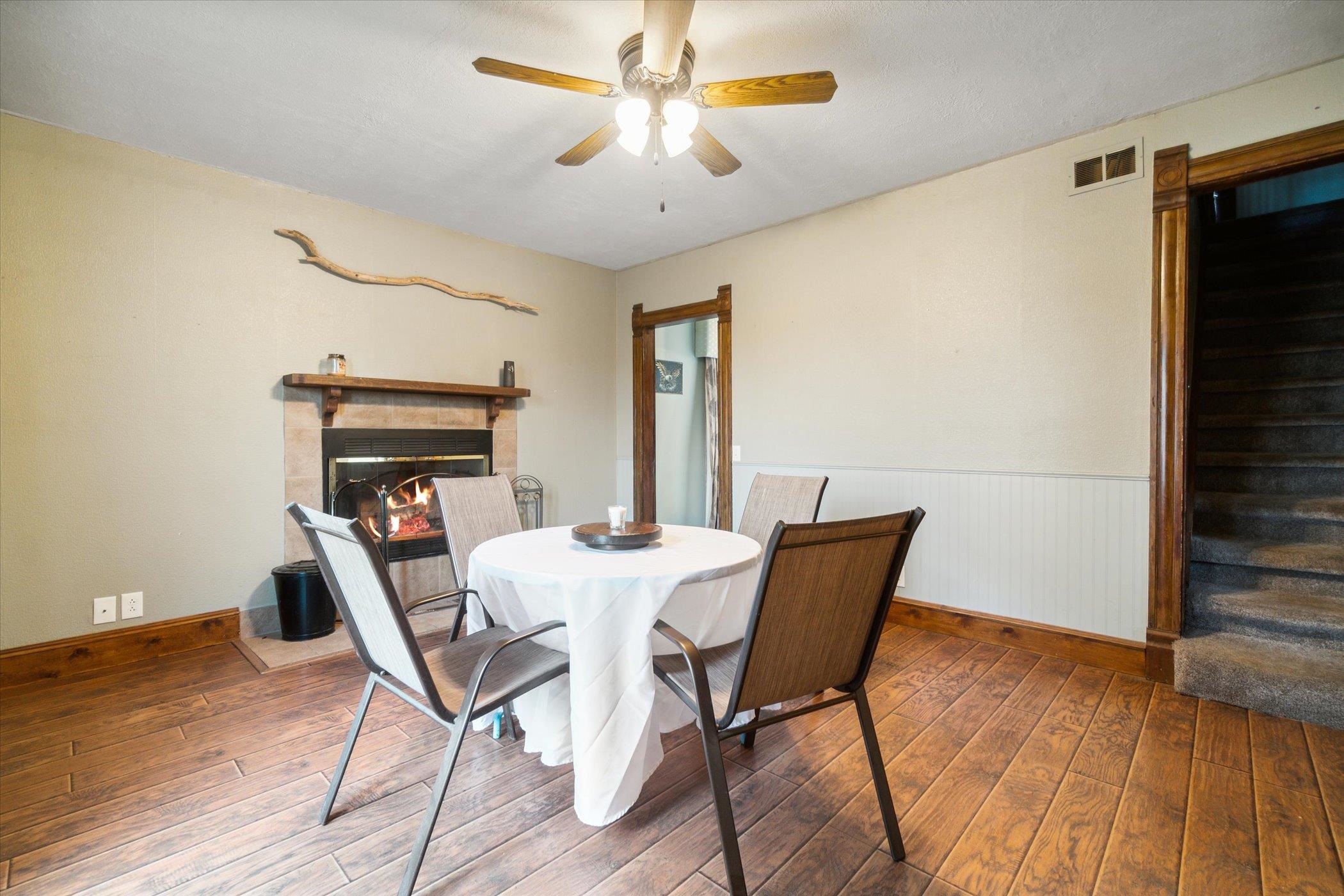 14188 Beloit Road Caledonia, IL 61011 - Photo 13 of 42 a view of a dining room with furniture window and wooden floor