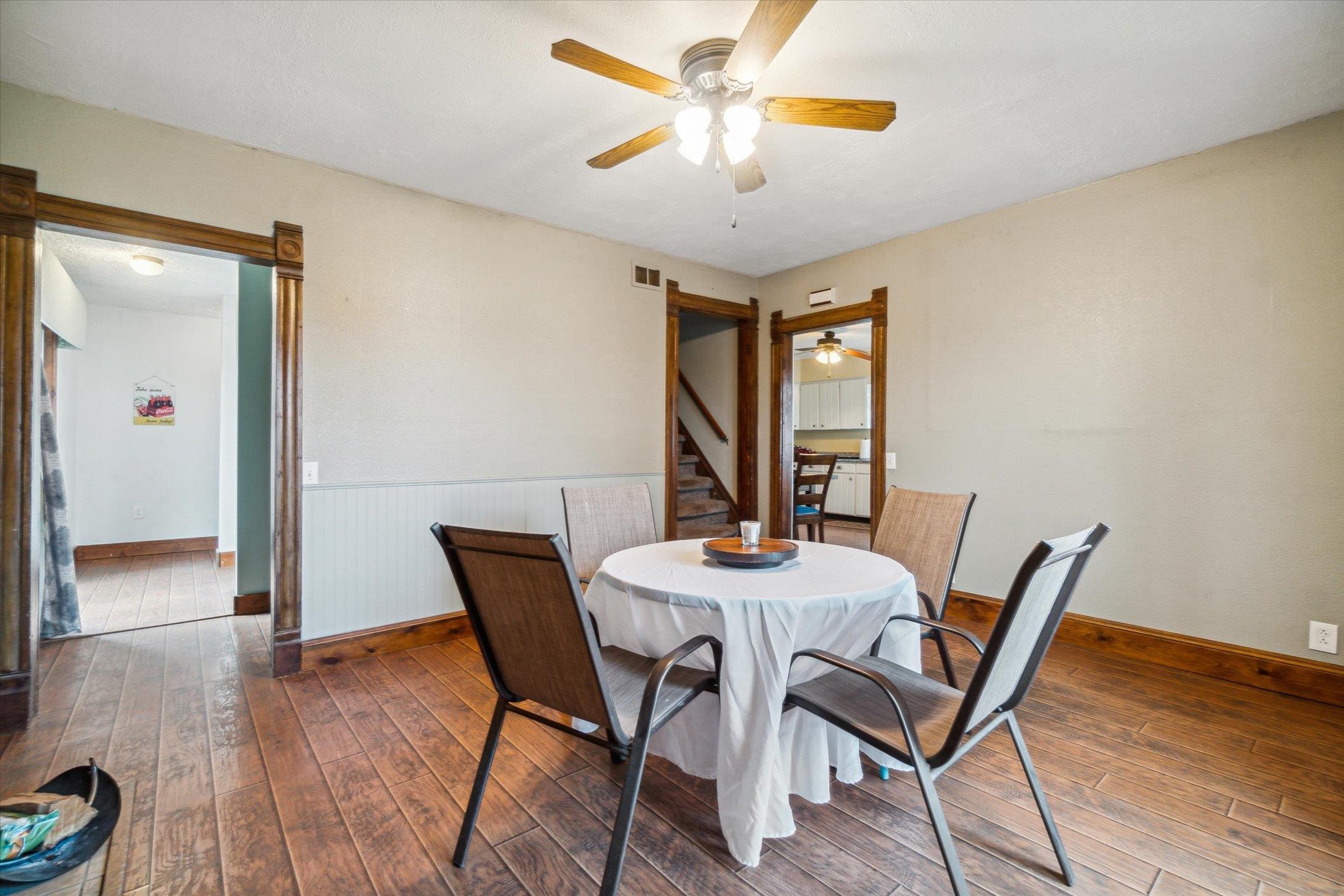 14188 Beloit Road Caledonia, IL 61011 - Photo 14 of 42 a view of a dining room with furniture and wooden floor