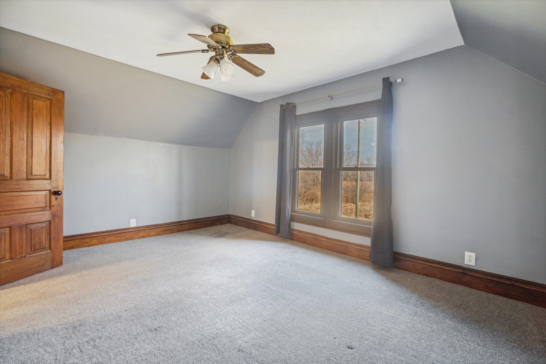 14188 Beloit Road Caledonia, IL 61011 - Photo 24 of 42 a view of an empty room with a window