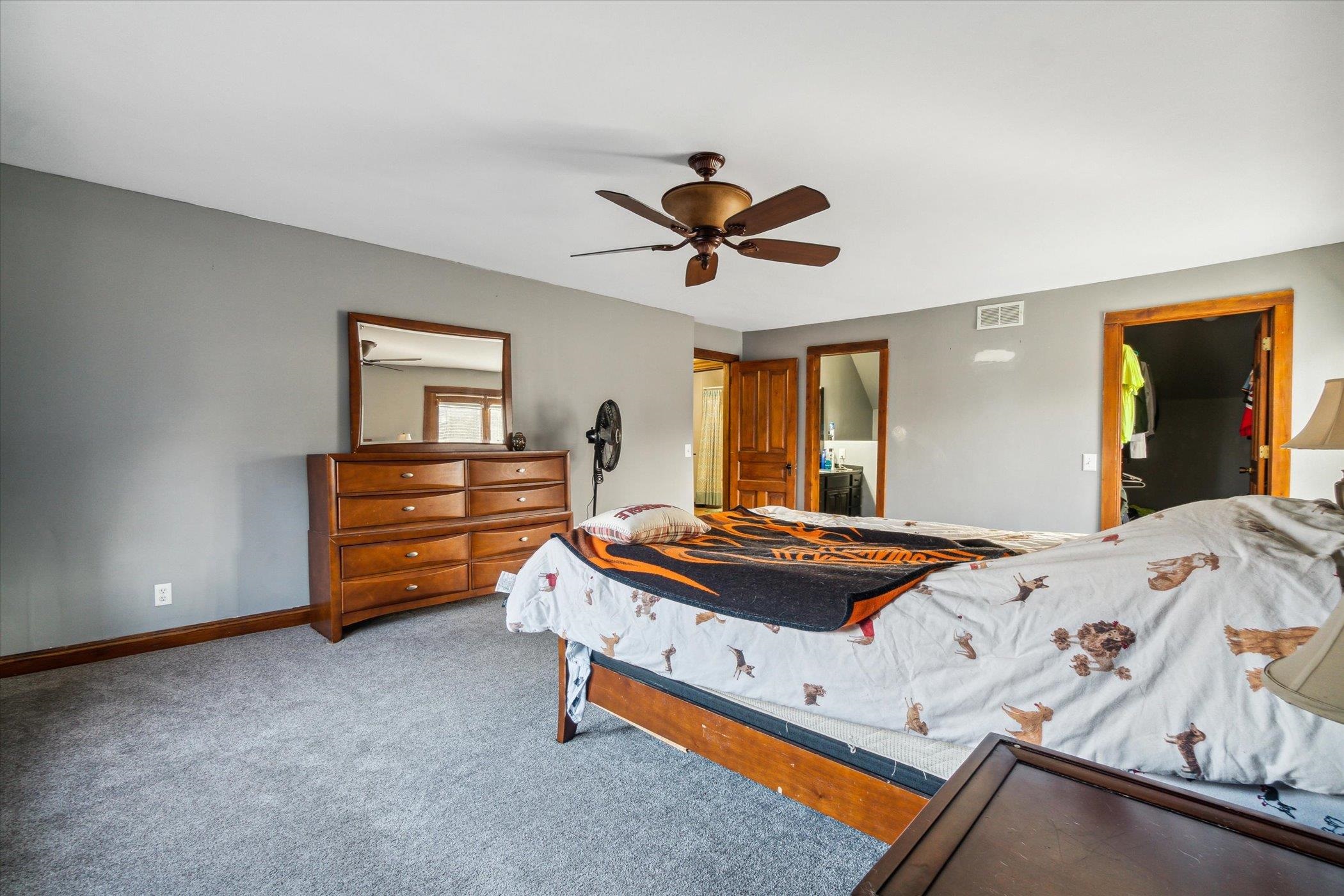 14188 Beloit Road Caledonia, IL 61011 - Photo 31 of 42 a bed room with bed and window