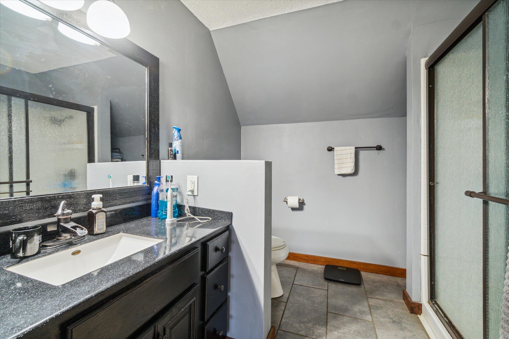 14188 Beloit Road Caledonia, IL 61011 - Photo 32 of 42 a room with a sink and a refrigerator