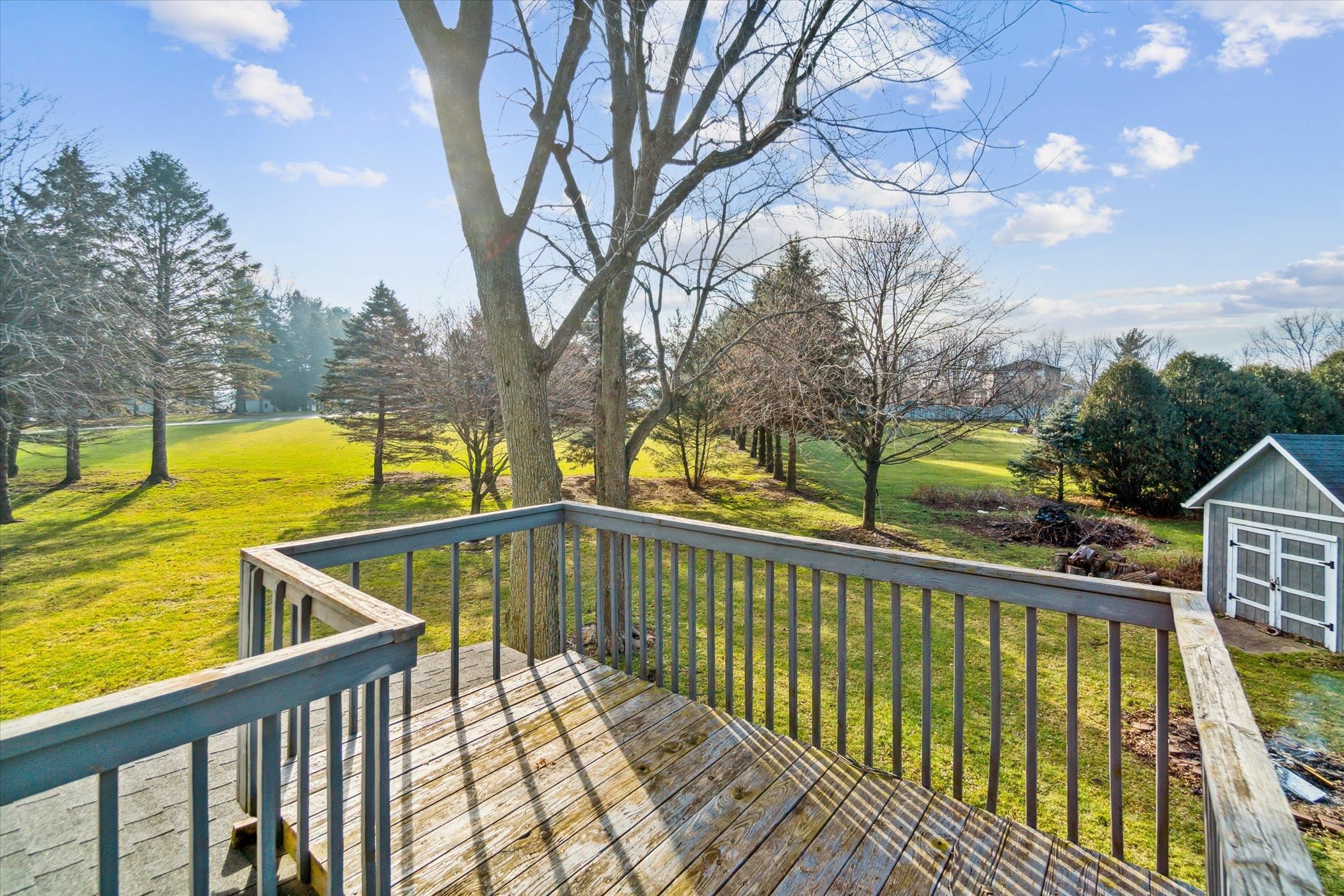 14188 Beloit Road Caledonia, IL 61011 - Photo 36 of 42 a view of a balcony with trees