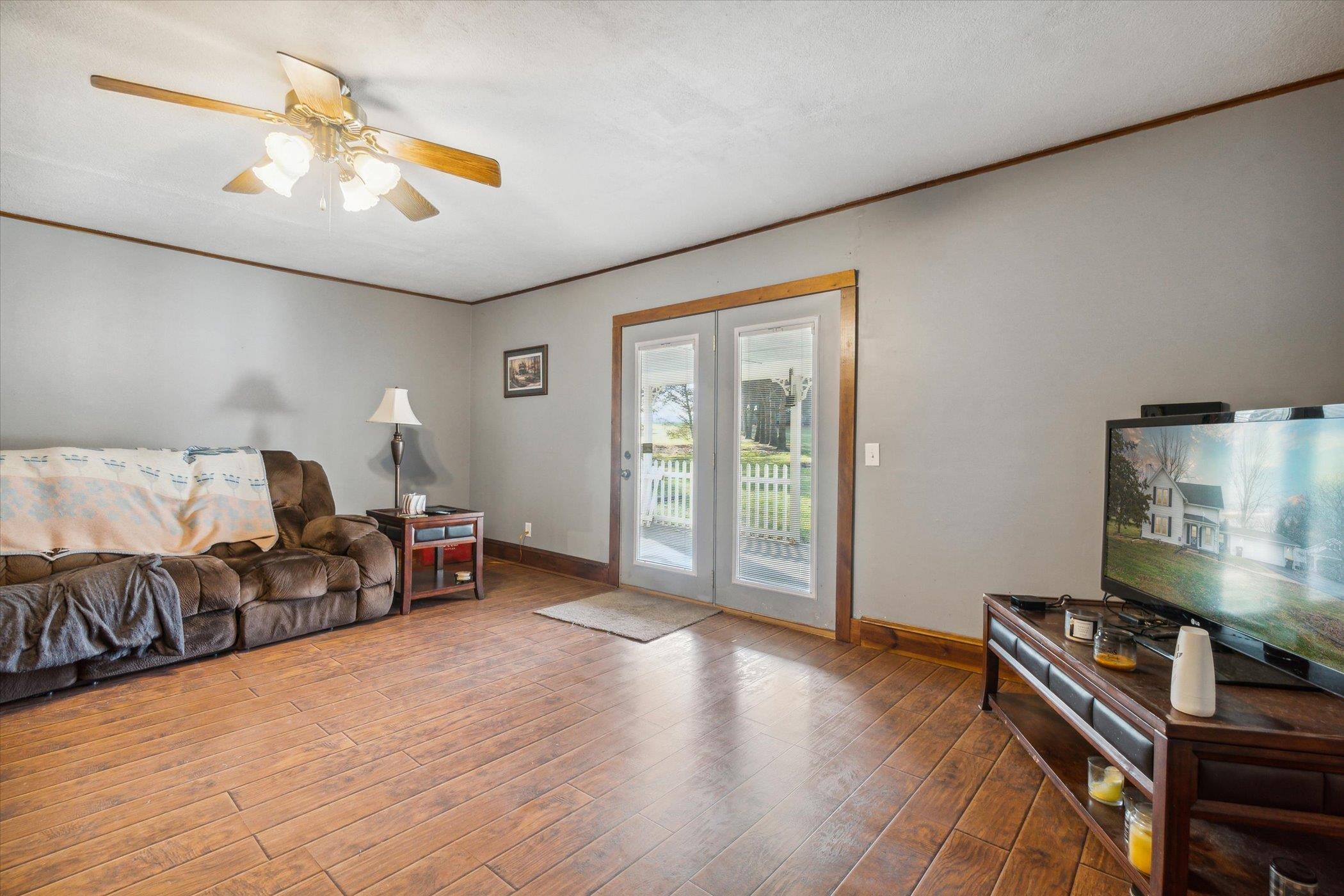 14188 Beloit Road Caledonia, IL 61011 - Photo 7 of 42 a bedroom with furniture and a window