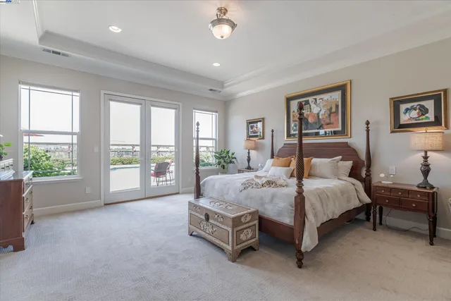 a bed room with furniture and a lamp