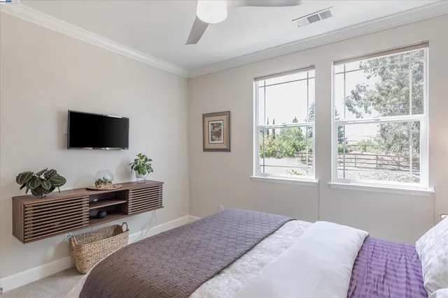 a bathroom with a shower a toilet and a shower