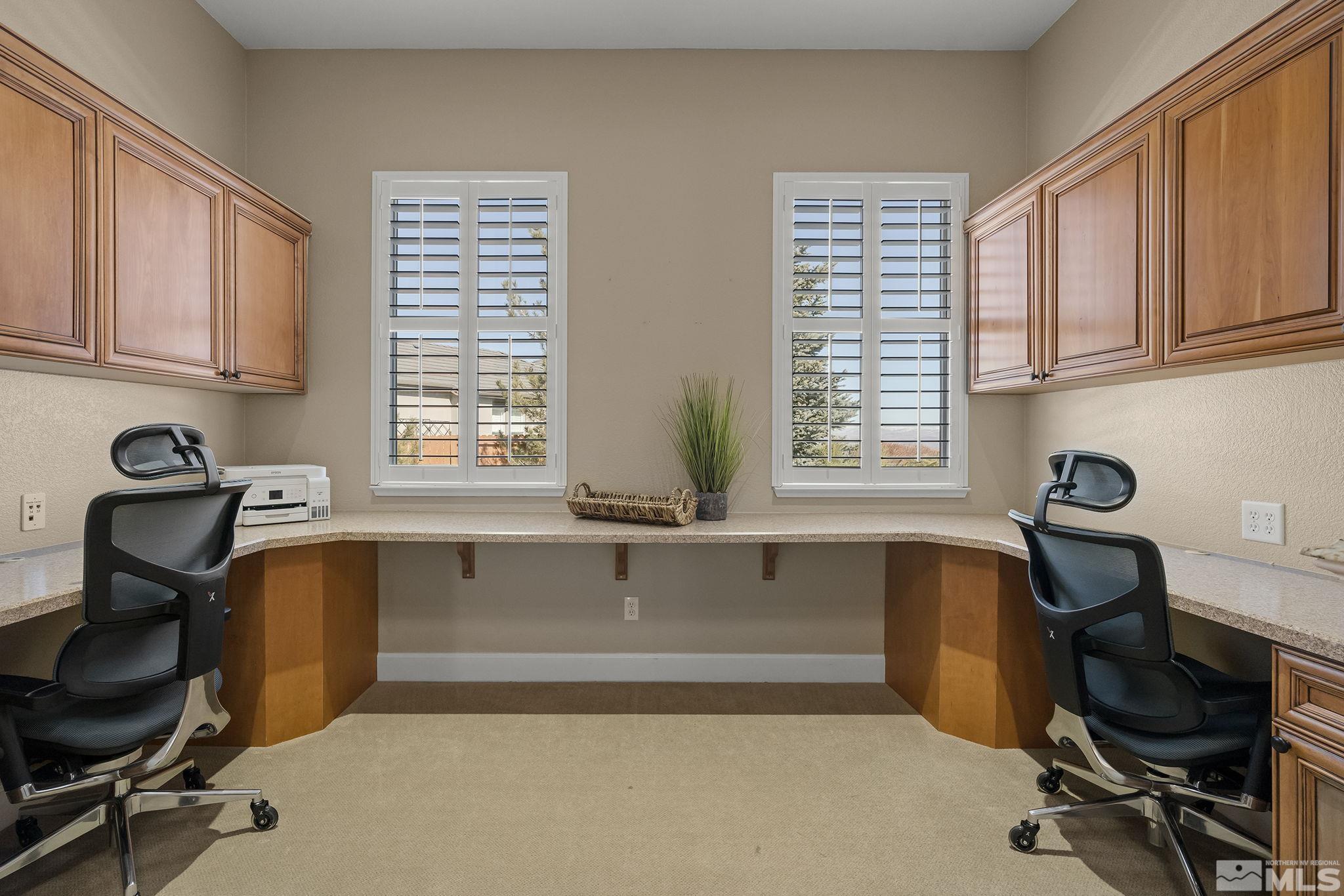 6982 Peacepipe Court Reno, NV 89511 - Photo 19 of 28 a bathroom with a granite countertop sink and a bathtub