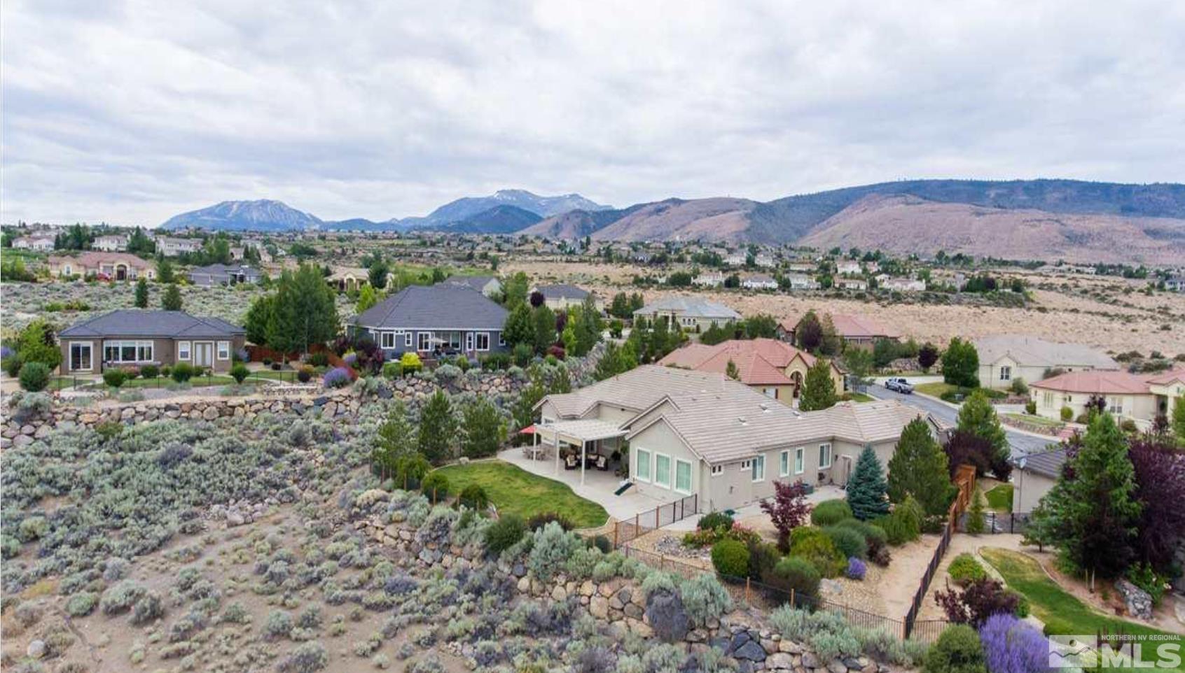6982 Peacepipe Court Reno, NV 89511 - Photo 24 of 28 an aerial view of multiple house