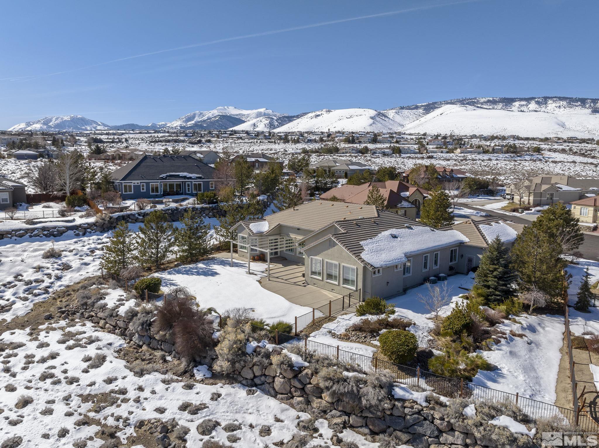 6982 Peacepipe Court Reno, NV 89511 - Photo 26 of 28 a view of a city