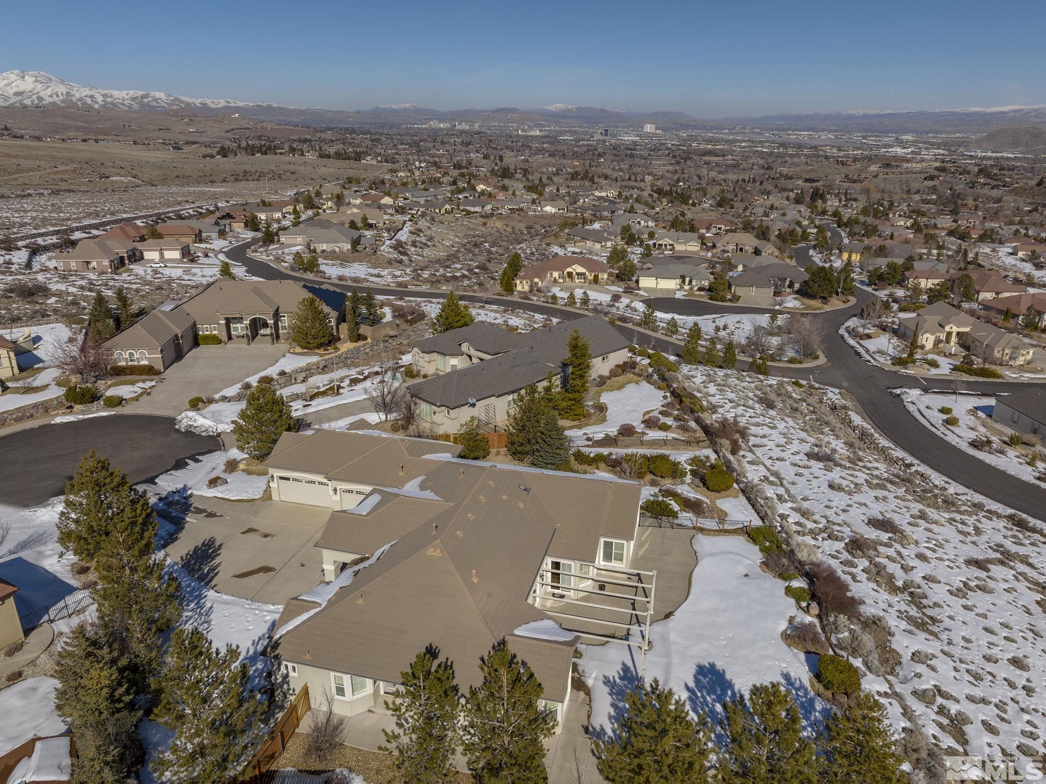 6982 Peacepipe Court Reno, NV 89511 - Photo 27 of 28 an aerial view of residential building and lake