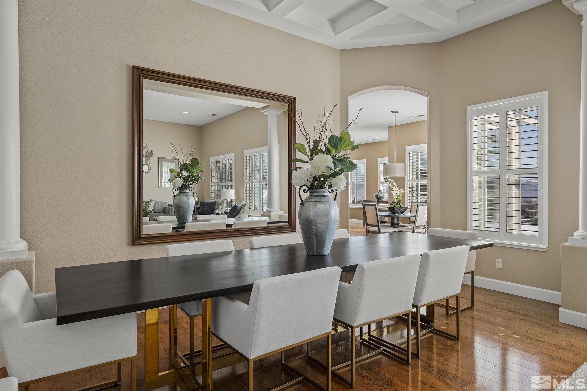 6982 Peacepipe Court Reno, NV 89511 - Photo 5 of 28 a dining room with furniture and wooden floor