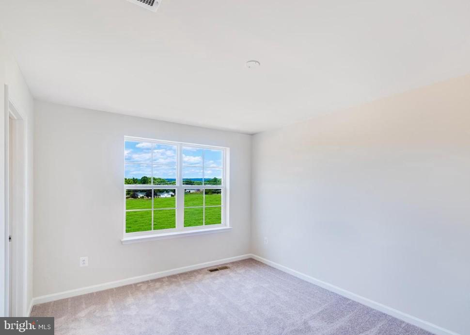 154 Cooperage Road Inwood, WV 25428 - Photo 14 of 19 a view of an empty room with a window